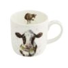 Fine bone china mug with illustrated black and white cow on front and cow on inner rim