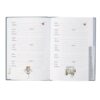 Wrendale Highland Cow Address Book Inside view of address book showing lined pages with address and birthday sections and illustrated tabs