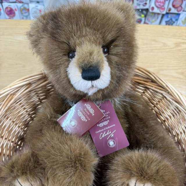 Close-up of Charlie Bears Boggle face showing brown fur and black plastic eyes
