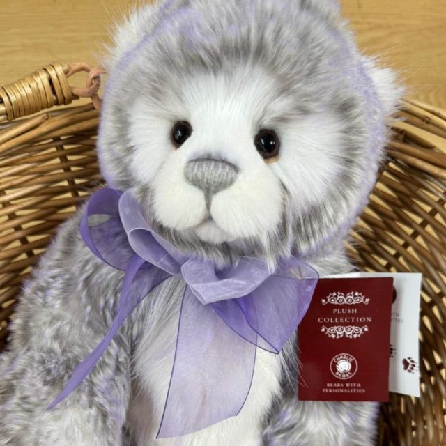 Charlie Meghan Charlie Bears Meghan plush bear showing detailed face and lilac bow with tag