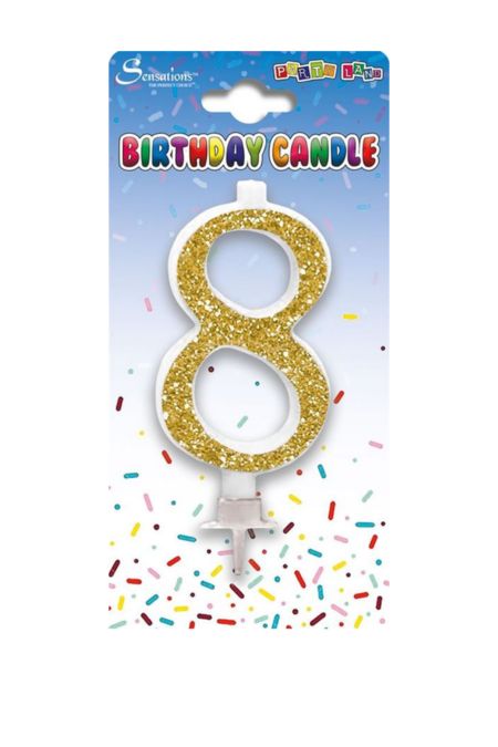 Gold glitter number 8 birthday candle on card packaging