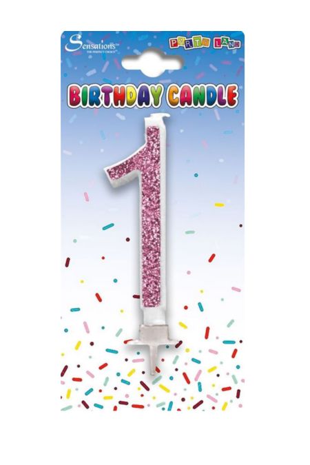 Pink glitter number 1 birthday cake candle on white card with confetti background