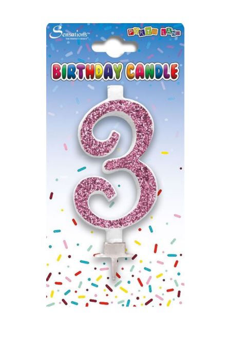 Pink glitter number 3 birthday candle from Sensations on a party-themed backing card