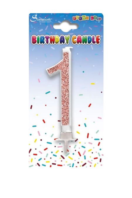 Sensations rose gold glitter number 1 birthday candle in packaging with confetti background