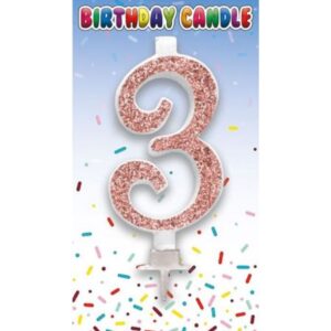 Rose gold glitter number 3 birthday candle with holder on party-themed packaging