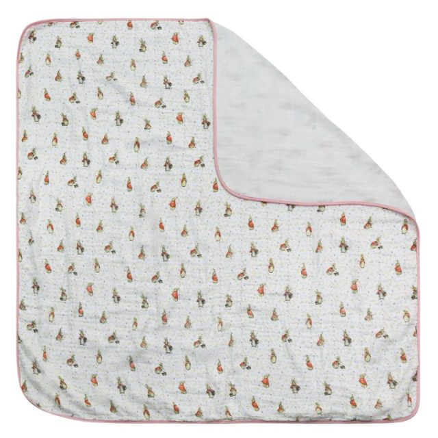 Flopsy Baby Collection Blanket by Beatrix Potter showing patterned fabric with characters and soft backing