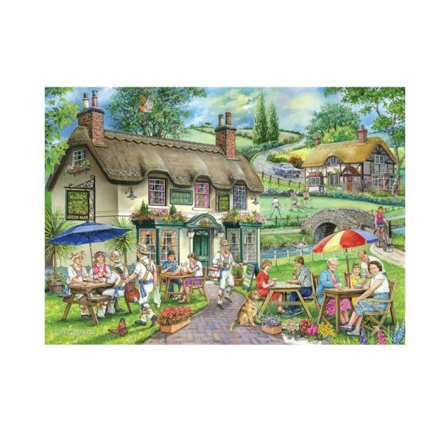 Completed Green Man jigsaw puzzle showing a colourful village pub scene with people outdoors