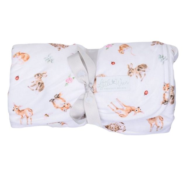 Folded Wrendale Little Forest baby blanket with woodland animal illustrations and grey ribbon