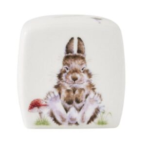 Money box featuring a sitting rabbit and mushroom illustration