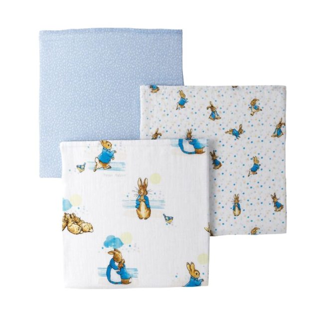 Set of three folded Peter Rabbit baby muslin squares in various character prints
