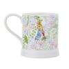 Peter Rabbit Mug Side view of ceramic mug featuring Peter Rabbit holding a radish amidst delicate floral design
