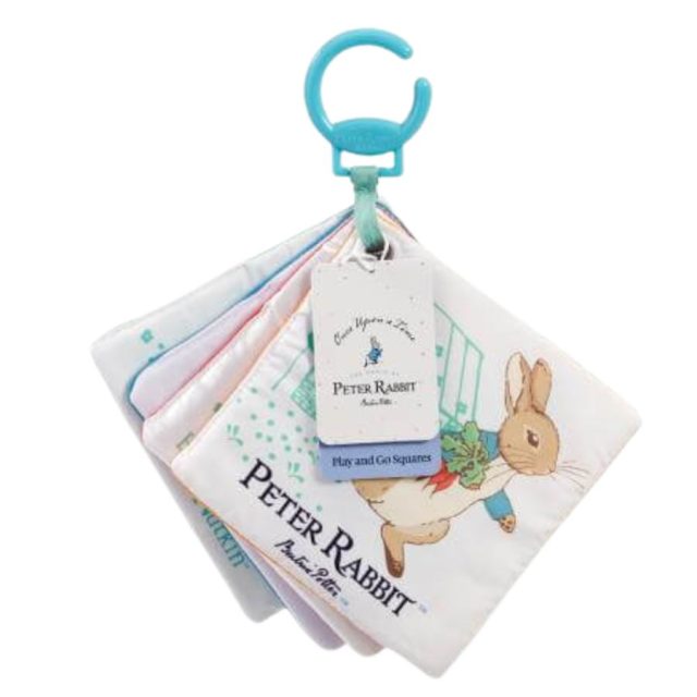 Peter Rabbit Play & Go Squares Folded Peter Rabbit Play And Go Squares soft book hanging from a blue plastic ring