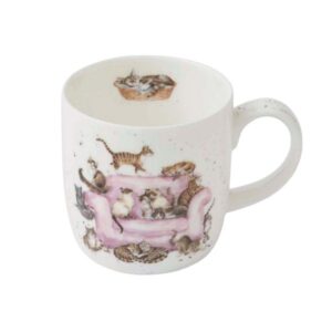 Wrendale cat mug featuring multiple cats around a pink sofa and a cat inside the rim