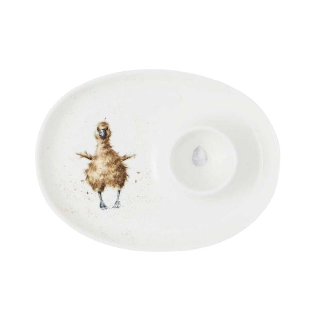 Oval egg saucer featuring a fluffy gosling design and an egg cup area