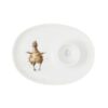 Oval egg saucer featuring a fluffy gosling design and an egg cup area