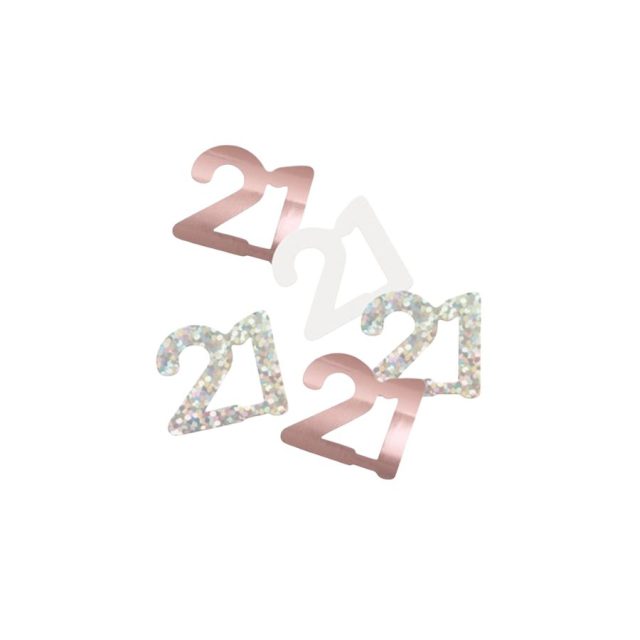 Loose rose gold and silver foil 21 shaped confetti pieces scattered