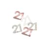 Loose rose gold and silver foil 21 shaped confetti pieces scattered