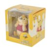 Flocked Winnie the Pooh figurine boxed with yellow packaging featuring honey design