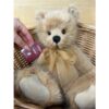 CB245381B Beanstalk Charlie Bears Beanstalk plush bear in basket with tag held beside it showing detailed features