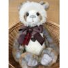 Terence Charlie Bear Charlie Bears Terence plush panda bear sitting in wicker basket showing soft fur and brown bow