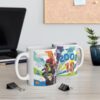 Two ceramic mugs with colourful 18th birthday flashback design featuring 2008 highlights on a desk