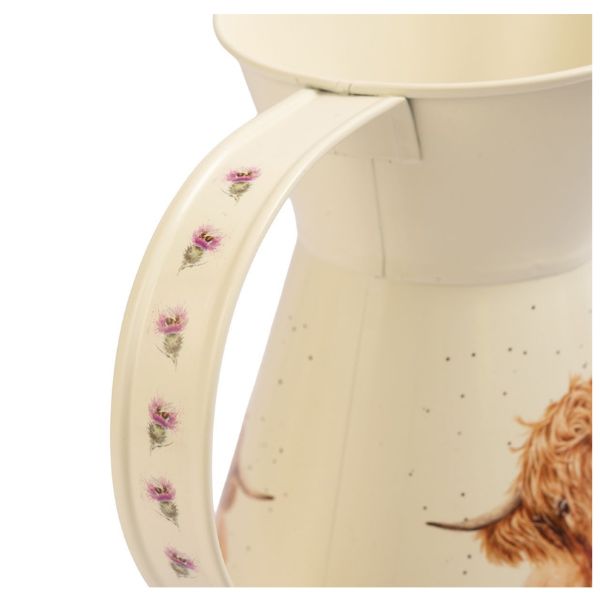 Close-up of flower jug handle decorated with pink thistle flowers
