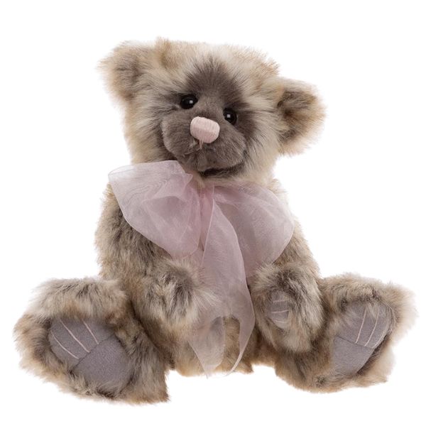 Charlie Bears Sunday plush bear sitting with a large light pink organza bow