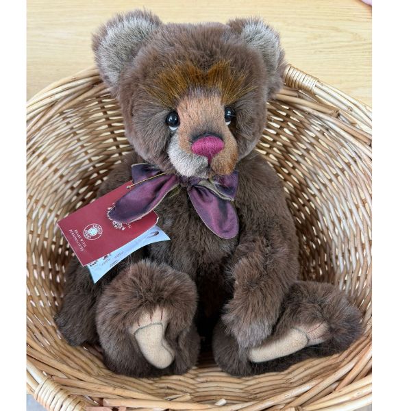 Charlie Bears Mr Brown plush bear in wicker basket showing burgundy bow and tag