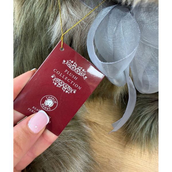 Rosa CB252559 Close-up of Charlie Bears Rosa plush bear tag and silver-grey ribbon bow