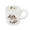 Fine bone china mug featuring a seated fluffy Rosie rabbit illustration