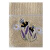 Riggs Bees in Meadow Lemon Close-up of yellow Riggs Bees in Meadow tea towel featuring embroidered bees and purple and white flowers