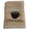 Beige Riggs tea towel with embroidered steaming coffee cup and text Coffee Morning